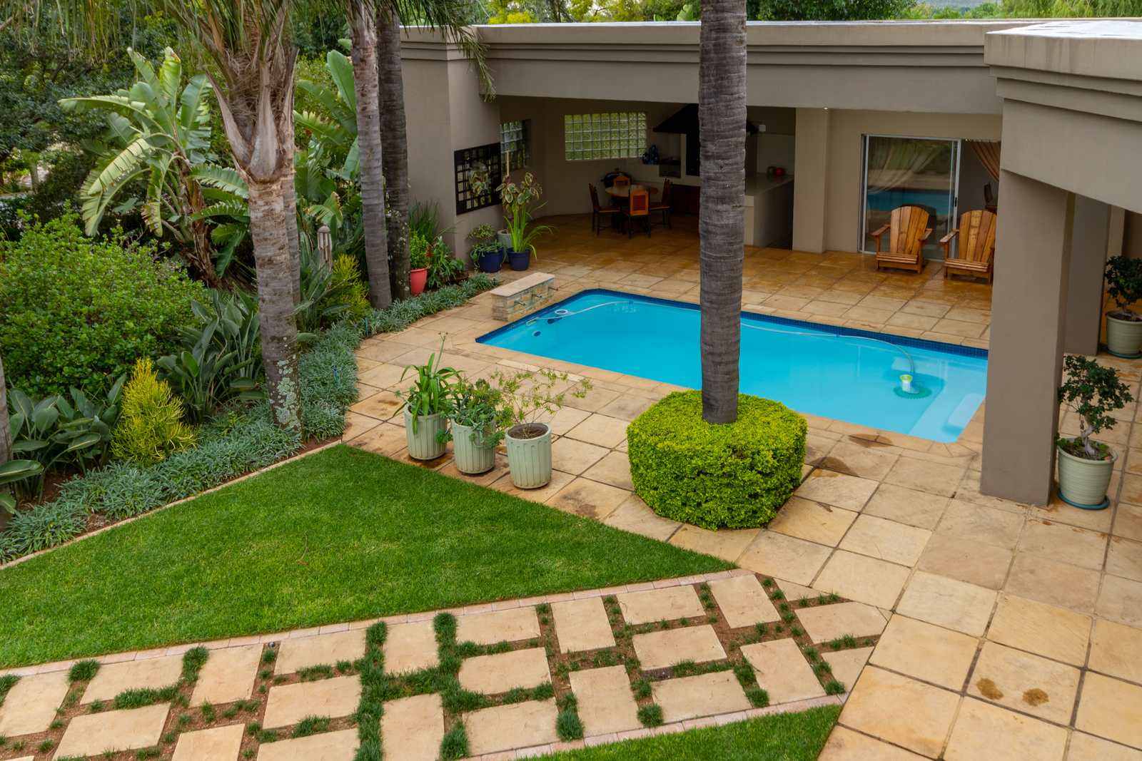 A landscaped pool courtyard at a Krugersdorp home