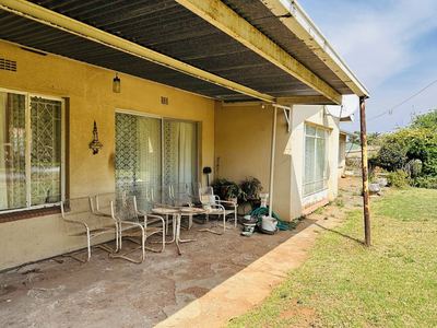 118 Buiten Street — covered patio leading to the garden