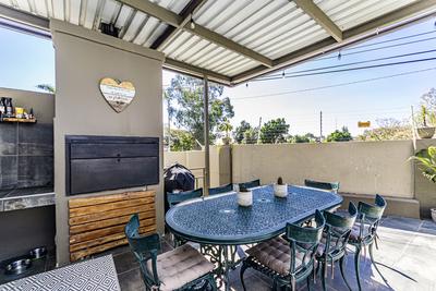 12 Theoschea Estate &mdash; covered patio with built-in braai