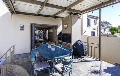12 Theoschea Estate &mdash; covered patio with built-in braai