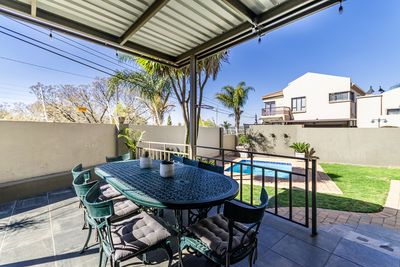 12 Theoschea Estate &mdash; covered patio with built-in braai